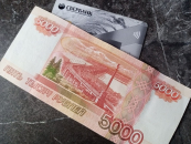 Снять наличные можно на кассе в магазинах