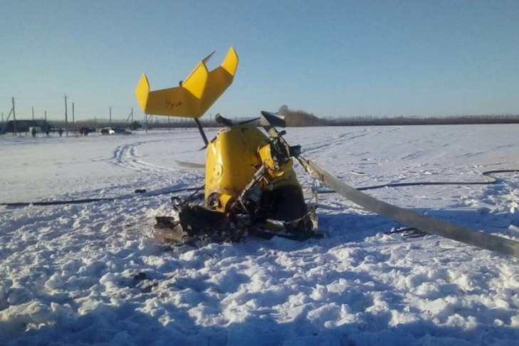 Появились первые фото крушения вертолета в Новосибирской области