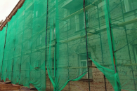 С 24 жилых домов в Новосибирске снимут «лоскутные» фасады магазинов и аптек