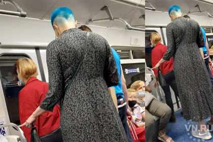 Гигантская синеголовая женщина потрясла пассажиров метро в Новосибирске